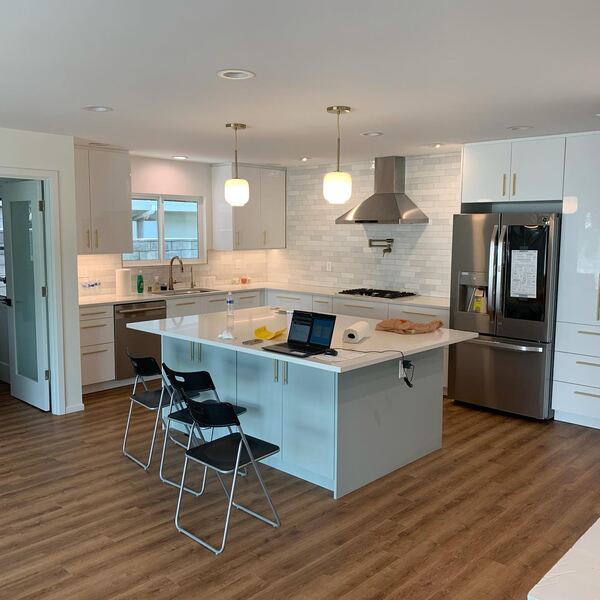 Remodeled kitchen in Arcadia with an island and pendant lights